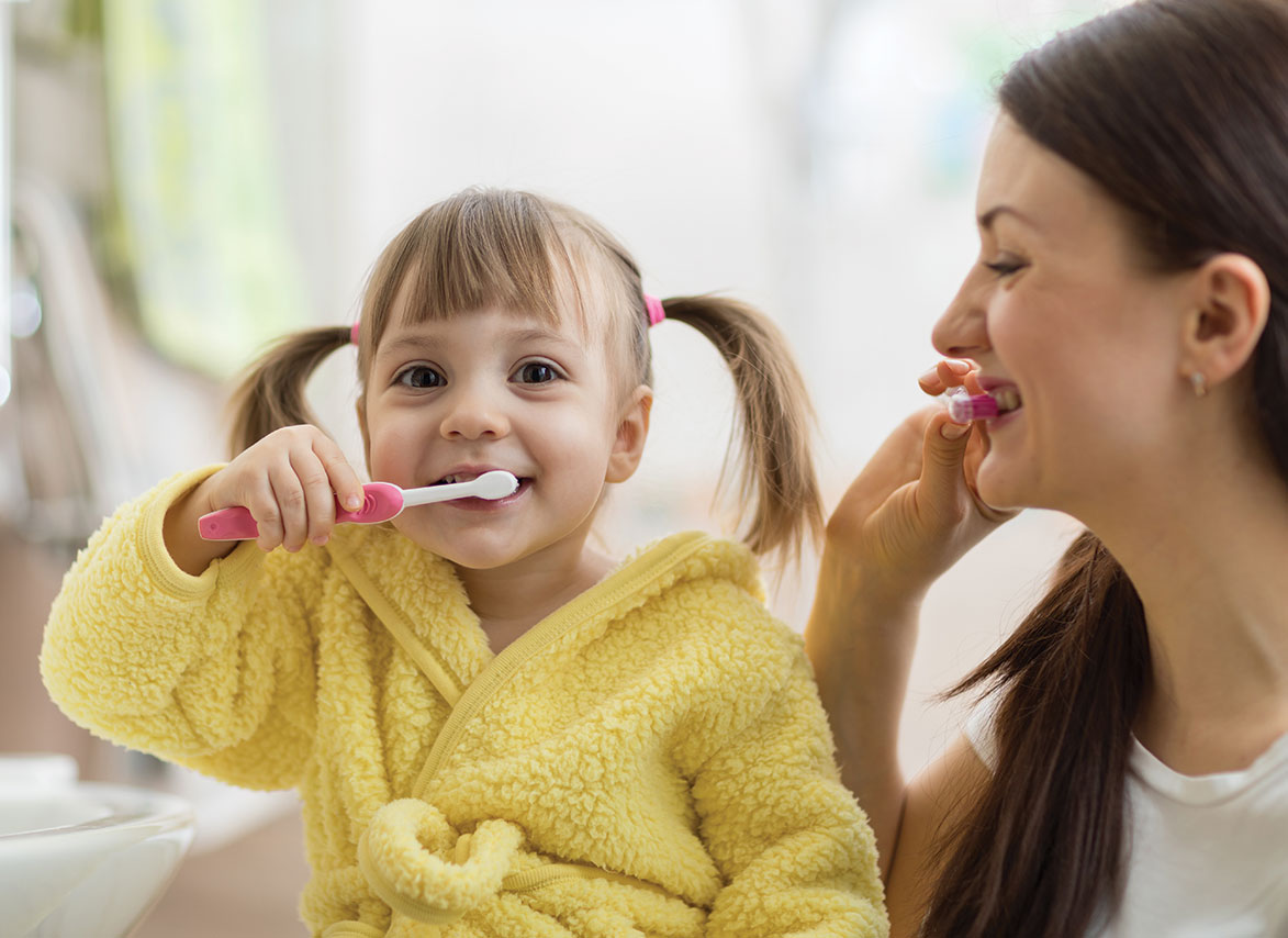 Smiling child Brushing Teeth